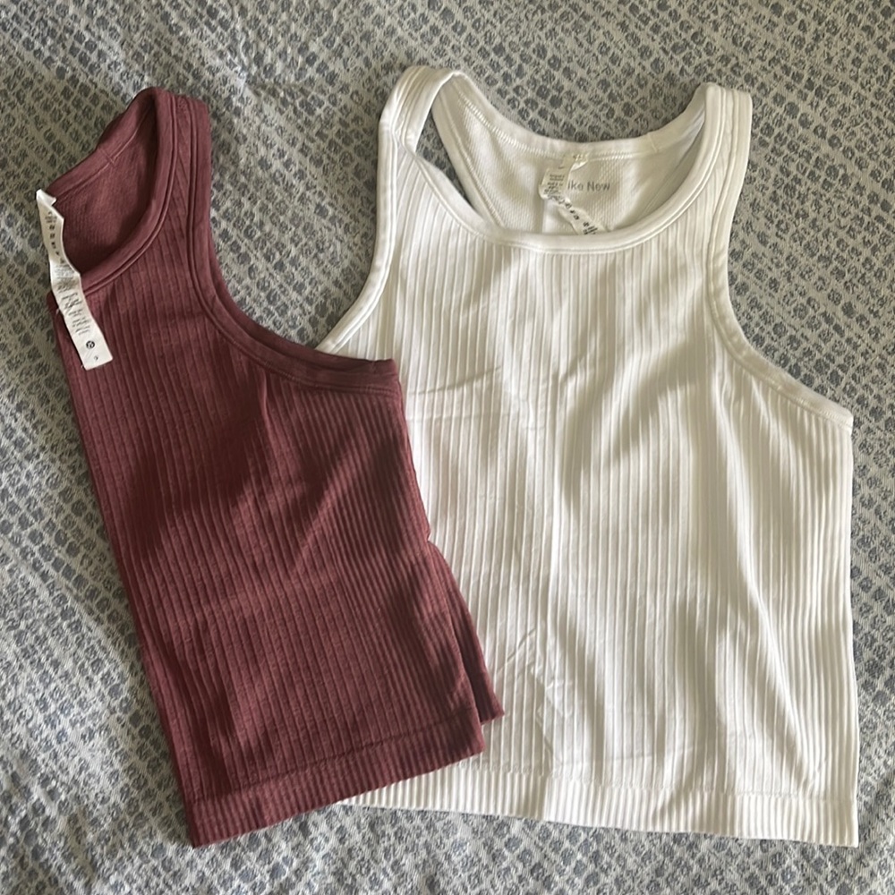 Lululemon ebb to street tank size 6, white and mauve